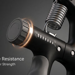 Black hand grip with adjustable resistance on a dark background