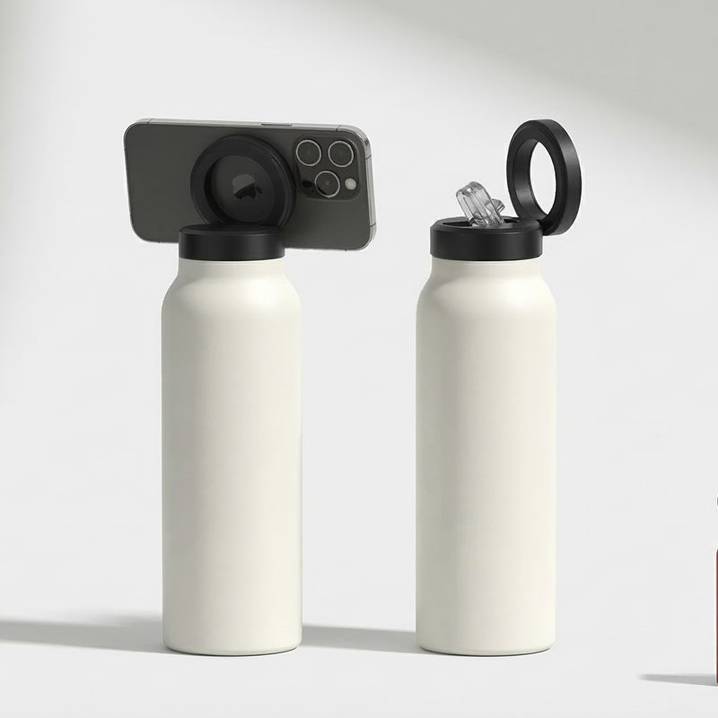 Set of white water bottles with black lids on a white background