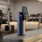 Smart water bottle with app on a gym bench